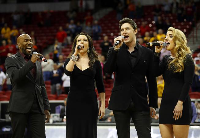The "Cocktail Cabaret" performs the national anthem before a game against UNR in the 2018 Mountain West Men's Basketball Championship at the Thomas & Mack Center Thursday, March 8, 2018.