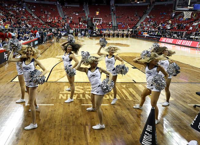 UNR cheerleaders perform before a game against UNLV in the 2018 Mountain West Men's Basketball Championship at the Thomas & Mack Center Thursday, March 8, 2018.