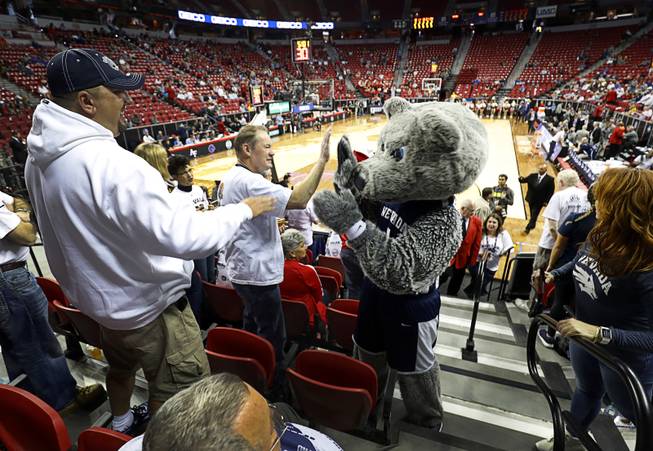 UNR mascot Alphie greets fans during a game against UNR in the 2018 Mountain West Men's Basketball Championship at the Thomas & Mack Center Thursday, March 8, 2018.