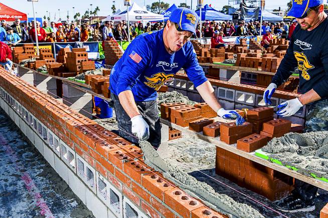 Teams compete in the Bricklayer 500 championship outside the Las Vegas Convention Center, Jan. 24, 2018. In contrast with other trade shows, displays of technology still play second fiddle to the actual race.