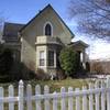 This Thursday, March 8, 2018 photo shows the Nystrsom Guest House pictured in downtown Reno, Nev. The home is one of two historic homes a developer wants to relocate for a revitalization project. Built in 1875, it was one of the first boarding houses catering to divorce-seekers who helped make Reno the ''Divorce Capital of the World'' during the 1930s because of its lax residency laws.