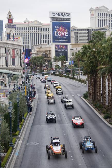 Off road racing vehicles parade up the Strip as part ...