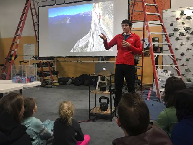 Rock climber Alex Honnold gives a talk titled "Alone on El Capitan" about his experience climbing Yosemite National Park's El Capitan without the use of ropes, at The Refuge Climbing Center, Thursday, March 15, 2018.