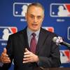 In this Thursday, Feb. 1, 2018, file photo, Major League Baseball Commissioner Rob Manfred speaks during a news conference at the baseball owners meetings in the Four Seasons Hotel, in Los Angeles. 