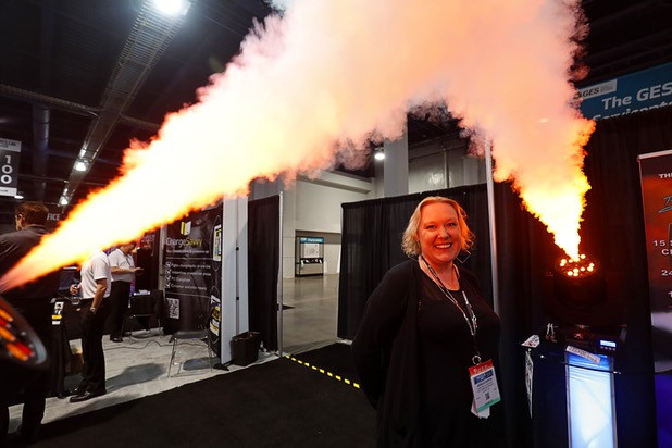Jessica Sarvis poses under fog machines at the CITC Special Effects booth during the annual Nightclub and Bar Show at the Las Vegas Convention Center Tuesday, March 27, 2018.