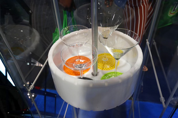A Bbot beverae server is displayed during the annual Nightclub and Bar Show at the Las Vegas Convention Center Tuesday, March 27, 2018. The automated server runs on tracks in the ceiling and is then lowered to the the appropriate table.