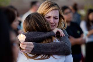 Family and friends of the three Las Vegas teens who were killed in an accident in southern California Thursday morning gather for a vigil at Knickerbocker park Friday  March 30, 2018.