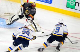 Vegas Golden Knights goaltender Malcolm Subban (30) blocks a shot on goal during an NHL hockey game against the St. LouIs Blues at T-Mobile Arena Friday, March 30, 2018.