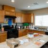 Smart devices are displayed in a kitchen during a Cox Smart Home tour, Thursday, April 5, 2018. The Cox Smart Home by KB Home is designed to showcase how high-speed internet, smart devices and monitoring apps offer greater control, comfort, safety and independence to older adults.
