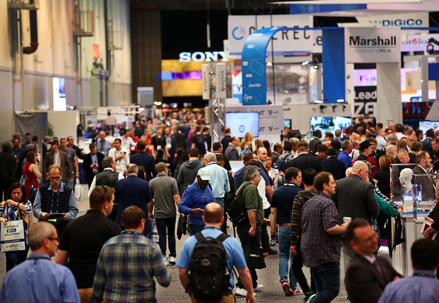 Attendees crowd an aisle during the National Association of Broadcasters (NAB) show at the Las Vegas Convention Center Tuesday, April 10, 2018. The convention runs through April 12 and is expected to draw more than 100,000 attendees from 160 countries.