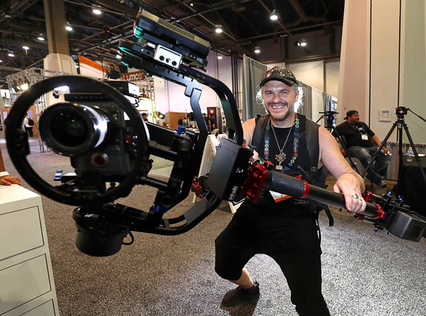 Thor Wixom of Dongguan LanParte Television Equipment Technology Company, displays a Letus Helix electronic stability system during the National Association of Broadcasters (NAB) show at the Las Vegas Convention Center Tuesday, April 10, 2018.