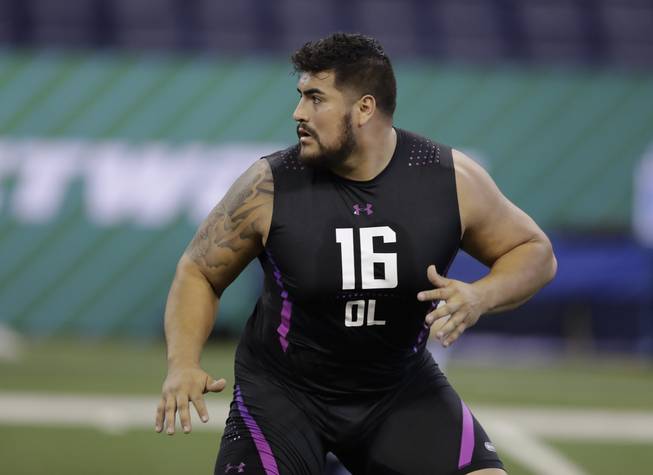 UTEP offensive lineman Will Hernandez runs a drill during the NFL football scouting combine, Friday, March 2, 2018, in Indianapolis.