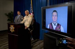 Metro Police Caption Robert Plummer, center, and FBI Special Agent Jose Perez discuss the homicide of a Venetian executive Mia Banks during a news conference at Metro Police Headquarters in Las Vegas Tuesday, April 17, 2018. Venetian employee Anthony Wrobel, shown on video monitor, is suspected of targeting Banks and also shooting Hector Rodriguez, Venetian executive director of table games, during a company picnic on Sunday.