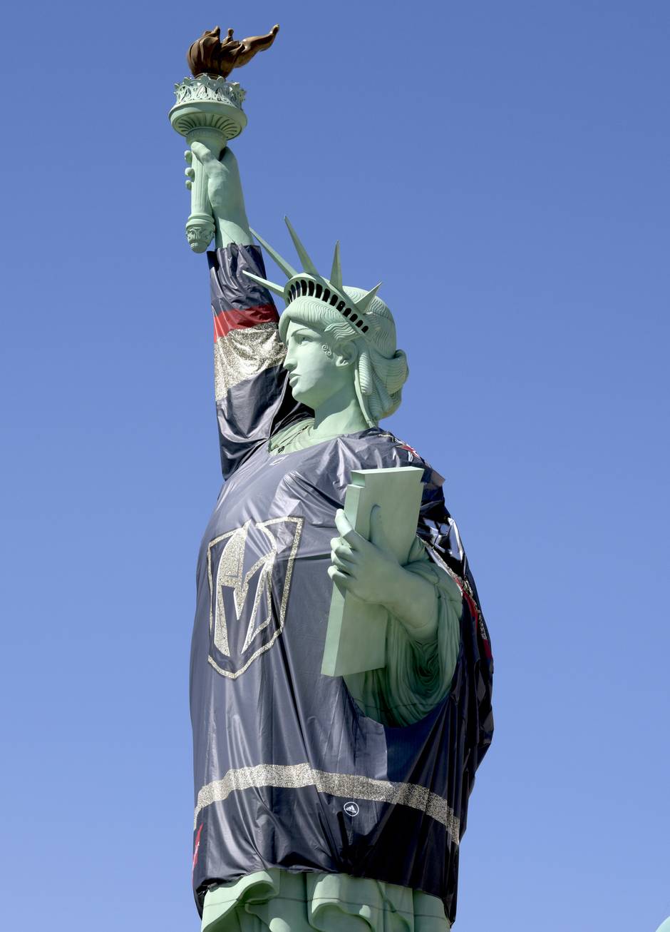 Las Vegas Statue Of Liberty Dons Vegas Golden Knights Jersey 