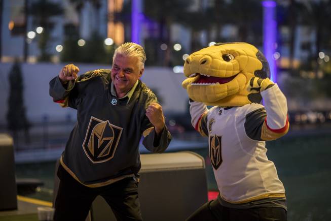 Clark County Commissioner Steve Sisolak poses with Chance during a Game 3 watch party event at Topgolf Las Vegas on Sunday, April 15, 2018. Vegas Golden Knights President Kerry Bubolz announced the watch party earlier in the week, which featured prize giveaways and special guest appearances.