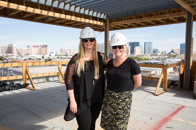 Lotus business manager Taryn Stephenson, at left, and developer Alison Burk, of Fore Property Company, pose for a photo on the rooftop of their new luxury apartments Lotus, on Spring Mountain near Valley View, Wed. April 25, 2018.