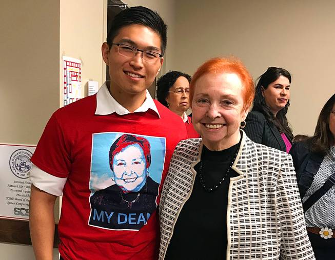 Chris Endo, president of the UNLV School of Medicine's first class of students, is shown with Dean Barbara Atkinson at a recent a Nevada Board of Regents meeting. Endo was among students at the meeting wearing T-shirts bearing Atkinson’s likeness, stylized to resemble the Barack Obama “Hope” image.