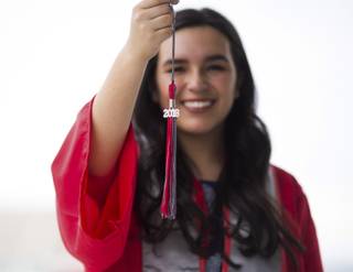 Charlotte Rosiak at age 16 is the youngest UNLV graduate during the spring semester commencement ceremony. She is receiving a degree in hospitality and has a near-4.0.