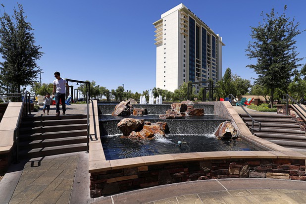 The Green, an area with fire pits and a water feature, helps connects the Berkeley Las Vegas timeshare tower  with the Silverton hotel-casino Thursday, May 17, 2018.