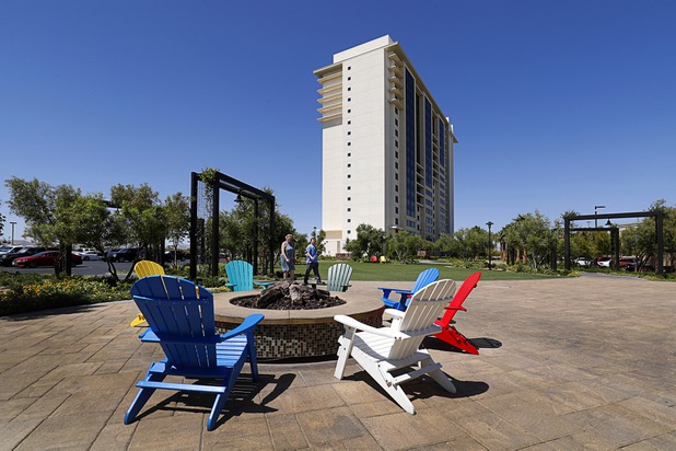 The Green, an area with fire pits and a water feature, helps connects the Berkeley Las Vegas timeshare tower  with the Silverton hotel-casino Thursday, May 17, 2018.