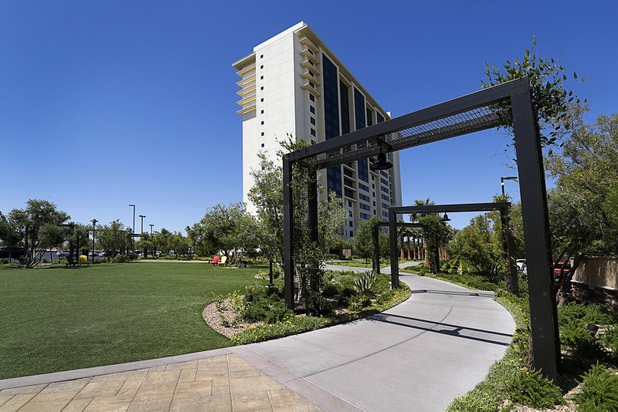 The Green, an area with fire pits and a water feature, helps connects the Berkeley Las Vegas timeshare tower  with the Silverton hotel-casino Thursday, May 17, 2018.