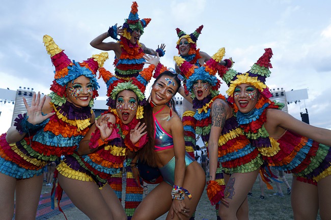 Lutao Xie, center, of Norwalk, Conn., poses with 