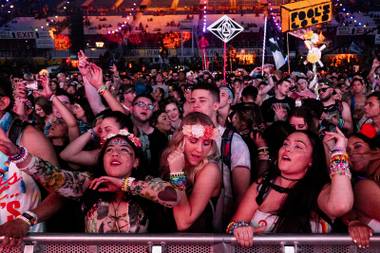 Festivalgoers dance at the Comic Meadow stage during Whethans set on the first night of the Electric Daisy Carnival at the Las Vegas Speedway, Saturday, May 19, 2018.