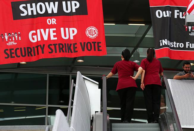 Members of the Culinary Workers Union, Local 226, head into the Thomas & Mack Center to vote on whether to authorize a strike Tuesday, May 22, 2018, in Las Vegas. A potential strike would affect 34 casino-hotels.