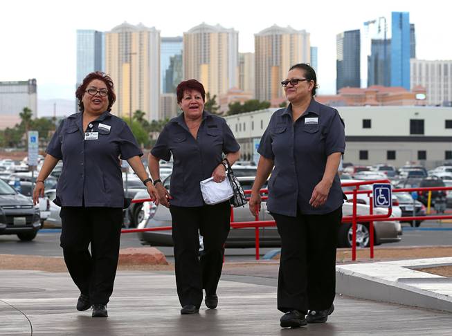 Members of the Culinary Workers Union, Local 226, head into the Thomas & Mack Center to vote on whether to authorize a strike Tuesday, May 22, 2018, in Las Vegas. A potential strike would affect 34 casino-hotels.