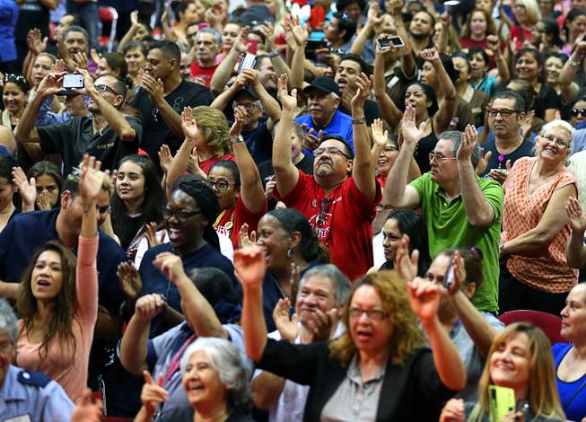 Members of the Culinary Workers Union, Local 226, applaud during a presentation before voting on whether to authorize a strike Tuesday, May 22, 2018, in Las Vegas. A potential strike would affect 34 casino-hotels.