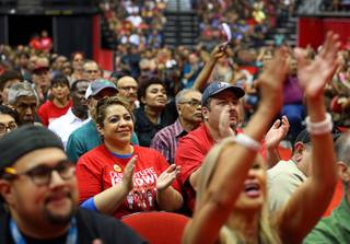 Members of the Culinary Workers Union, Local 226, applaud during a presentation before voting on whether to authorize a strike Tuesday, May 22, 2018, in Las Vegas. A potential strike would affect 34 casino-hotels.