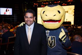 Chaparral High School basketball player Nick Doland poses for a photo with Golden Knights mascot Chance during the Las Vegas Sun Standout Awards at South Point, Wednesday, May 23, 2018.