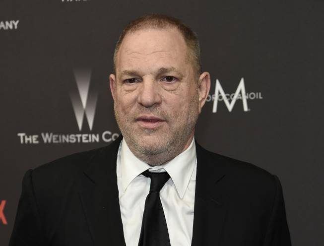 In this Jan. 8, 2017, photo, Harvey Weinstein arrives at The Weinstein Company and Netflix Golden Globes afterparty in Beverly Hills, Calif.