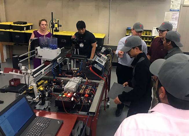 Students and instructors are shown in the advanced manufacturing lab at the Southeast Career and Technical Academy, Wednesday, May 23, 2018.