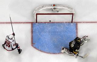 A shot by Capitals right wing Brett Connolly (not pictured) gets past Golden Knights goaltender Marc-Andre Fleury for a score in the second period of Game 2 of the NHL Stanley Cup Final at T-Mobile Arena Wednesday, May 30, 2018. Washington's Andre Burakovsky is at left. 