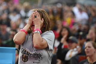 A Vegas Golden Knights fan reacts during a watch party for Game 3 of the NHL Stanley Cup Final between the Vegas Golden Knights and the Washington Capitals Saturday, June 2, 2018, at Toshiba Plaza.