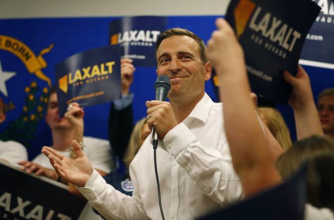 Nevada state Attorney General Adam Laxalt speaks at a campaign event Monday, June 11, 2018, in Las Vegas. Laxalt is running as a Republican for governor of Nevada. (AP Photo/John Locher)
