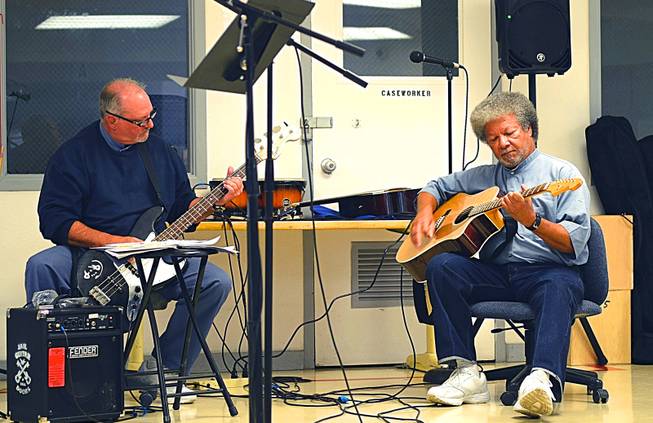 In a June 8, 2018 photo, inmates participate in a music workshop at the Northern Nevada Correctional Center in Carson City. 
