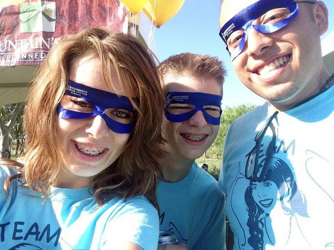 Lauren Pacheco, left, Brandon Osborn, center, and Frank Pacheco are cousins of the late MaKenzie Hanover and members of Team Kenzie, which raises money for Candlelighters Childhood Cancer Foundation of Nevada.