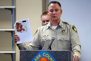 Metro Police Capt. Todd Raybuck holds up a map during a news conference on illegal fireworks at Clark County Fire Station 22 Thursday, July 5, 2018. The map shows the location of illegal fireworks complaints over the July 4th holiday.