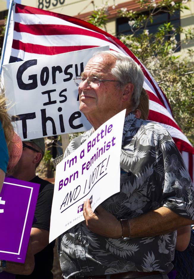 An activists looks on during a NARAL Pro-choice Organization press conference held outside Dean Heller's office building in response to President Trump's SCOTUS nominee announcement, Tuesday, July 10, 2018.