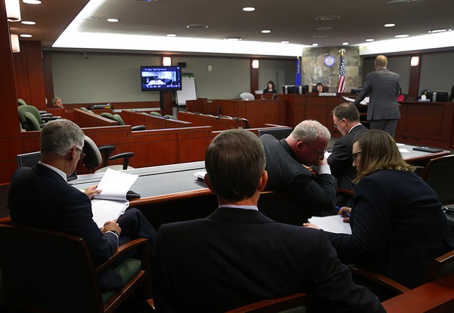 Attorneys for Alvogen confer during a hearing at the Regional ...