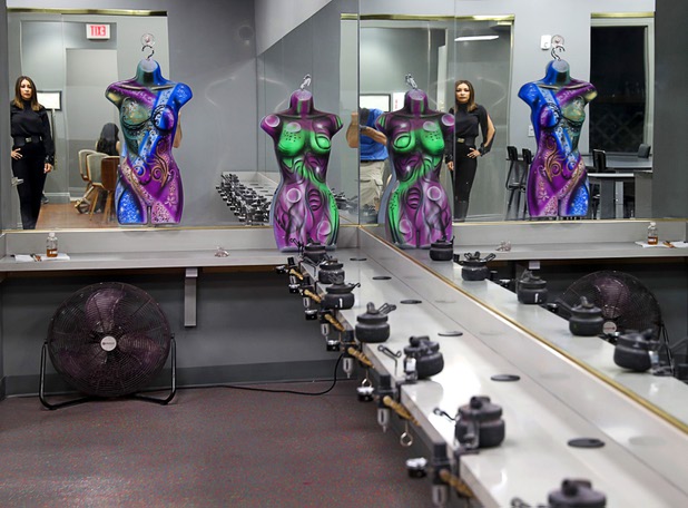 Owner Lissette Waugh stands in a airbrush and body painting classroom at L Makeup Institute, a makeup school and cosmetic store, at Tivoli Village, 440 S. Rampart Blvd., Thursday, July 12, 2018.