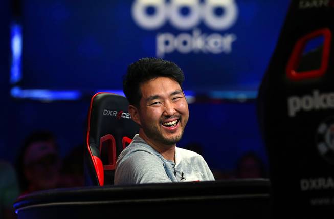 John Cynn smiles as he competes against Tony Miles during the World Series of Poker Main Event at the Rio Saturday, July 14, 2018.