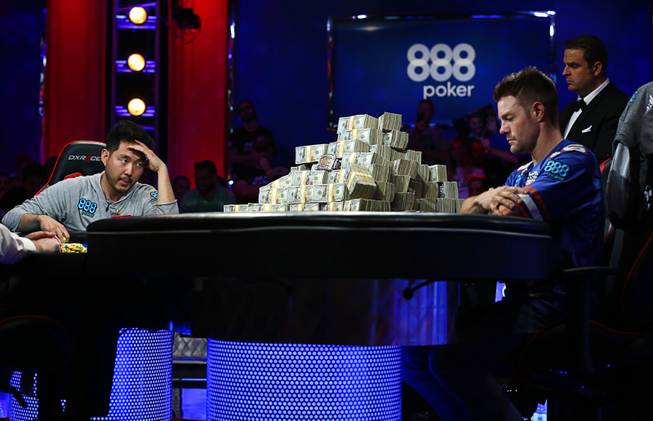 John Cynn, left, competes against Tony Miles during the World Series of Poker Main Event at the Rio Saturday, July 14, 2018.