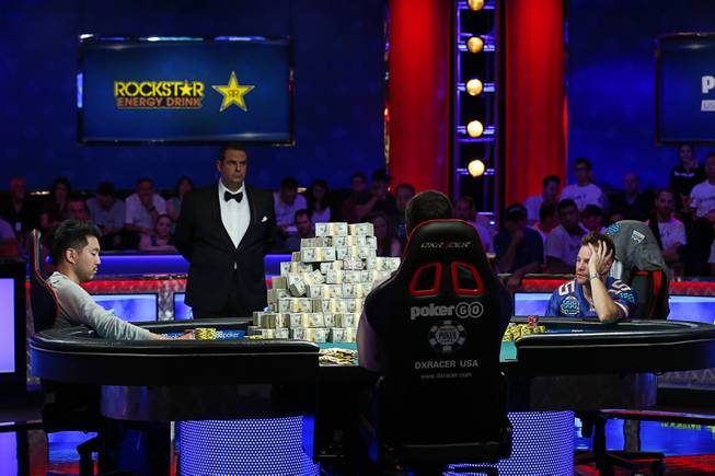 John Cynn, left, and Tony Miles compete during the World Series of Poker Main Event at the Rio Saturday, July 14, 2018.