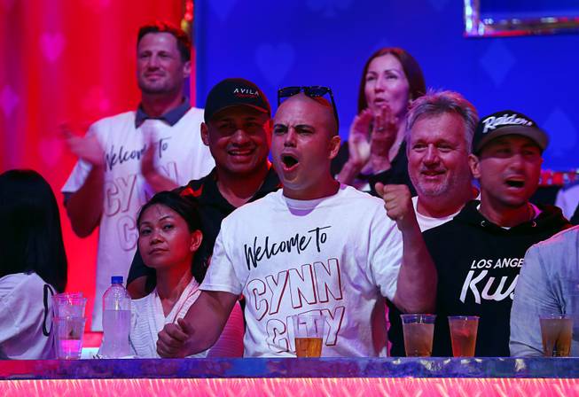 Supporters of John Cynn celebrate after he wins a hand competes during the World Series of Poker Main Event at the Rio Saturday, July 14, 2018.