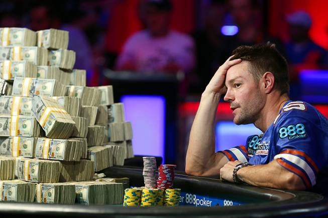 Tony Miles waits for play to resume after a break during the World Series of Poker Main Event at the Rio Saturday, July 14, 2018.