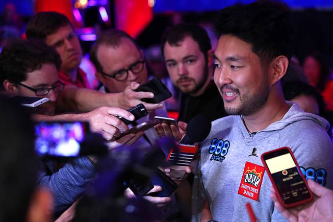 John Cynn is interviewed by reporters after winning the World Series of Poker Main Event at the Rio Sunday morning, July 15, 2018. Cynn won the championship bracelet and $8.8 million in prize money.