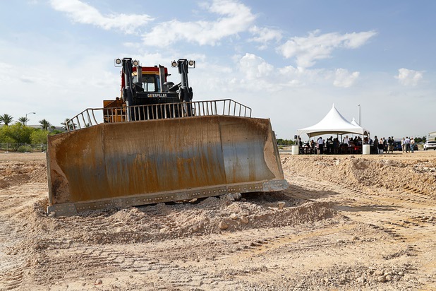 Officials gather under a tent for a groundbreaking ceremony for the first innovation building in the Harry Reid Research & Technology Park (UNLV Tech Park) on West Sunset Road near Durango Drive Tuesday, July 17, 2018.
